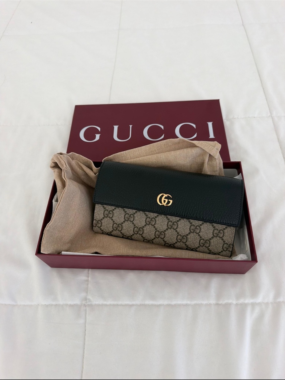 Gucci Black Leather Wallet on a Chain.